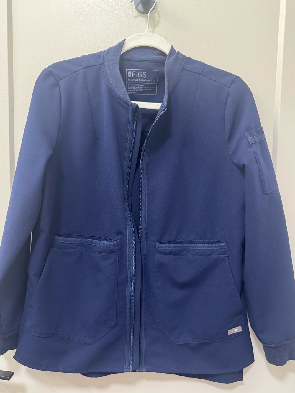 Figs navy scrub jacket size small.